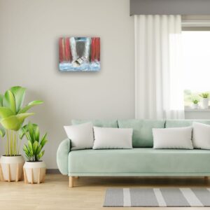 Modern living room with artwork displayed.